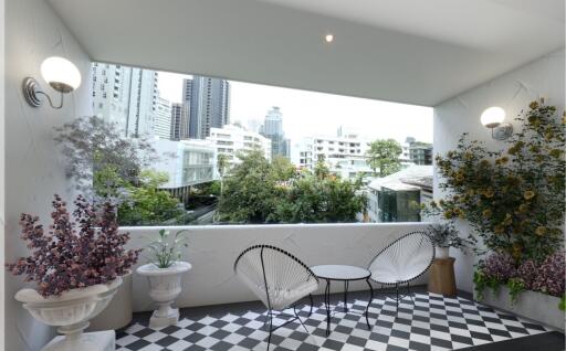 Outdoor balcony with a view of the city