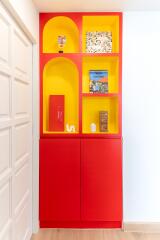 Brightly colored hallway storage unit