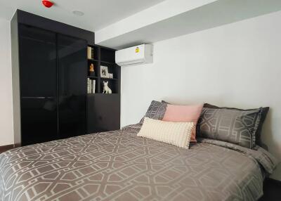 Modern bedroom with double bed and wardrobe