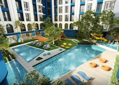 Outdoor pool and recreational area in modern apartment complex