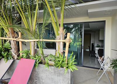 Outdoor patio area with view into living space