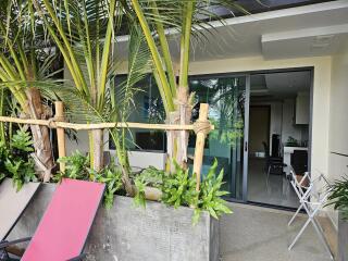 Outdoor patio area with view into living space