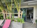 Outdoor patio area with view into living space