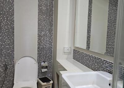 Modern bathroom with sink and toilet