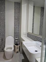 Modern bathroom with sink and toilet