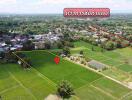 Aerial view of a green plot of land in a rural area