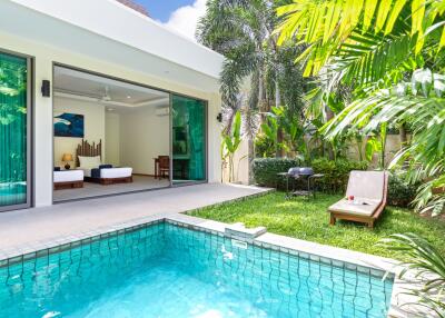 Outdoor area with pool, garden, and view into bedroom