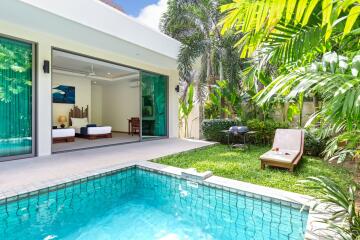 Outdoor area with pool, garden, and view into bedroom