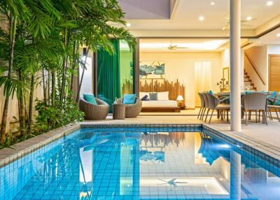 Outdoor pool area with adjacent indoor living space