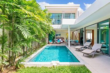 Luxurious backyard with pool and lounge area