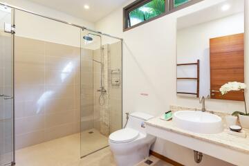 Modern bathroom with glass shower enclosure