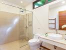 Modern bathroom with glass shower enclosure