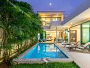 Modern house with swimming pool and garden at dusk