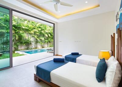 Spacious bedroom with poolside view