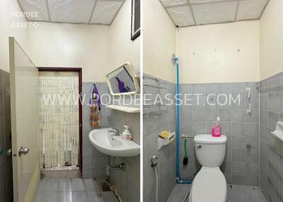 Bathroom showing a washbasin, mirror, and toilet