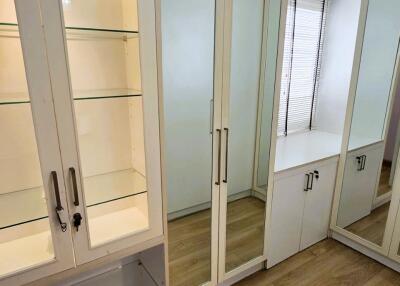 Bedroom with built-in closets