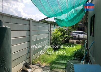 Outdoor area with shaded area and greenery