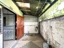 Garage space with door and window grille