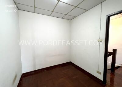 empty room with parquet flooring