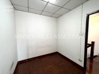 empty room with parquet flooring