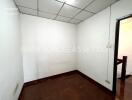 empty room with parquet flooring