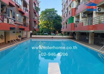 Outdoor swimming pool in an apartment complex