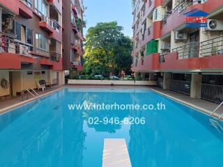 Outdoor swimming pool in an apartment complex