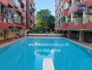 Outdoor swimming pool in an apartment complex