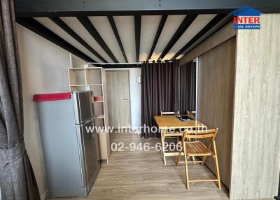 Cozy dining area with wooden furniture and metal shelving