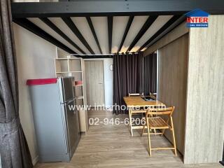 Cozy dining area with wooden furniture and metal shelving