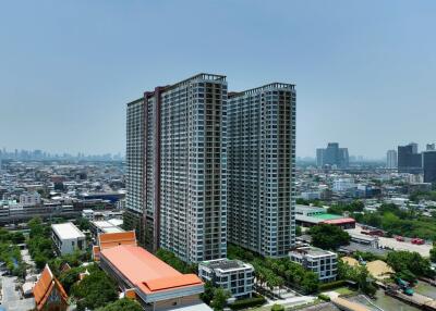 High-rise apartment buildings providing a panoramic view of the city.