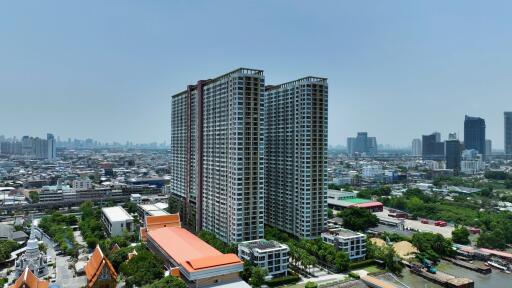 High-rise apartment buildings providing a panoramic view of the city.