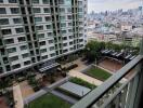 View from balcony overlooking building and cityscape