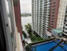 View of high-rise apartment buildings with a pool area