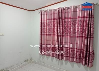 Bedroom with pink curtains and white tiled floor