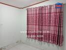 Bedroom with pink curtains and white tiled floor