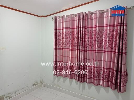 Bedroom with pink curtains and white tiled floor