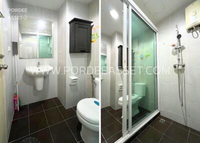 Modern bathroom with sink, toilet, and shower