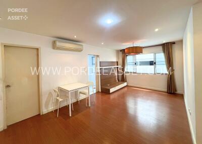 Spacious living room with dining area