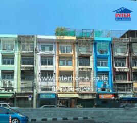 View of multi-story residential buildings with various colored facades