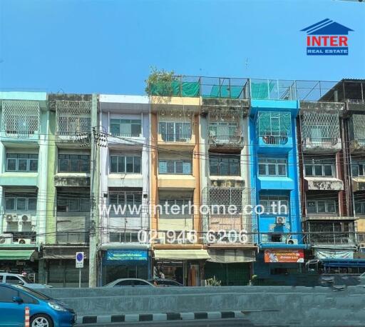 View of multi-story residential buildings with various colored facades