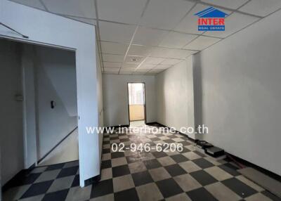 Unfurnished room with checkered flooring