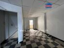 Unfurnished room with checkered flooring