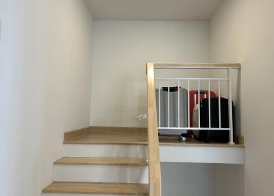 Staircase with luggage storage area