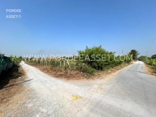 Fork in the road near a plot of land