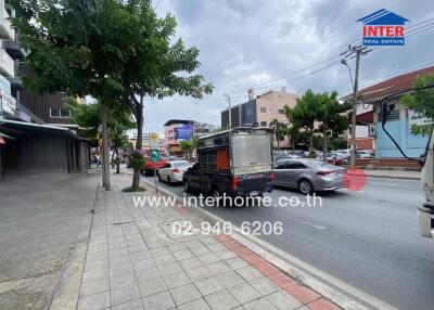 Street view with cars and buildings