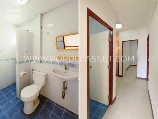 Bathroom with white fixtures and blue tile flooring