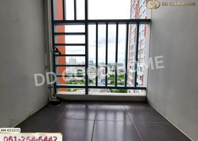 Balcony with a city view and metal railing