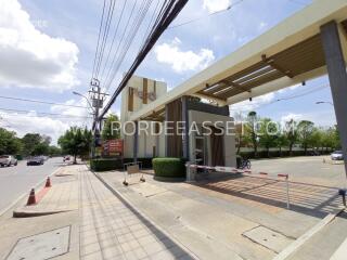 Main entrance of a building with a security gate