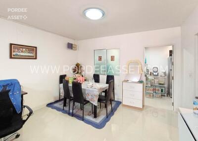 Modern dining room with table set for four